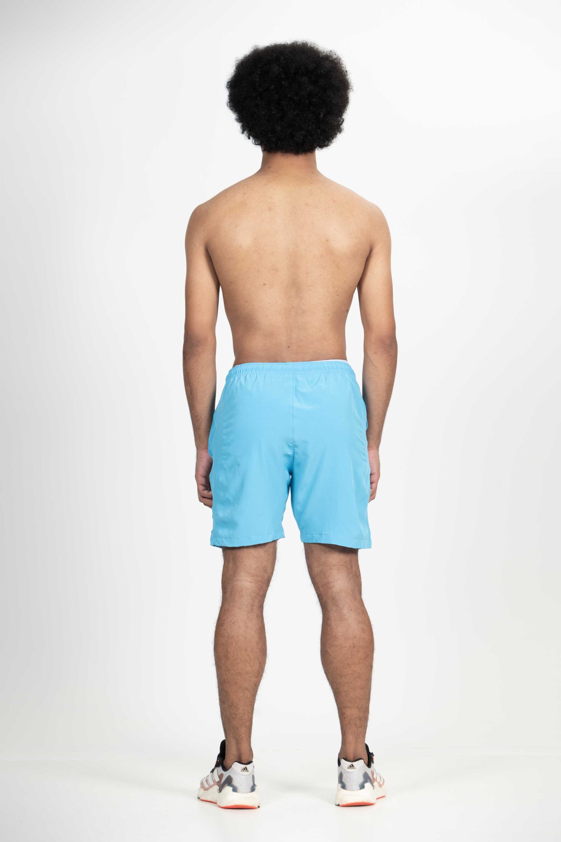 Bermuda shorts Dry-FIT Tech Comfort masculina azul turquesa, ideal para atividades esportivas e uso casual.